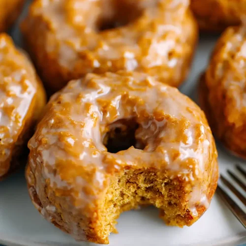 baked pumpkin donuts with maple glaze